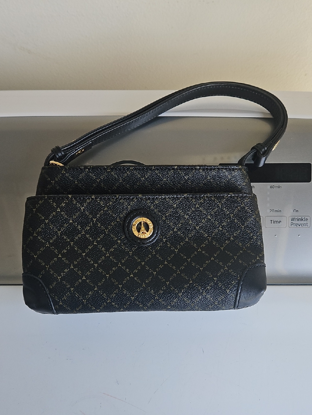La Tour Eiffel 1887 monogrammed Handbag Logo